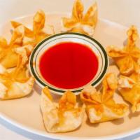 Crab Rangoon  · 8 pieces.