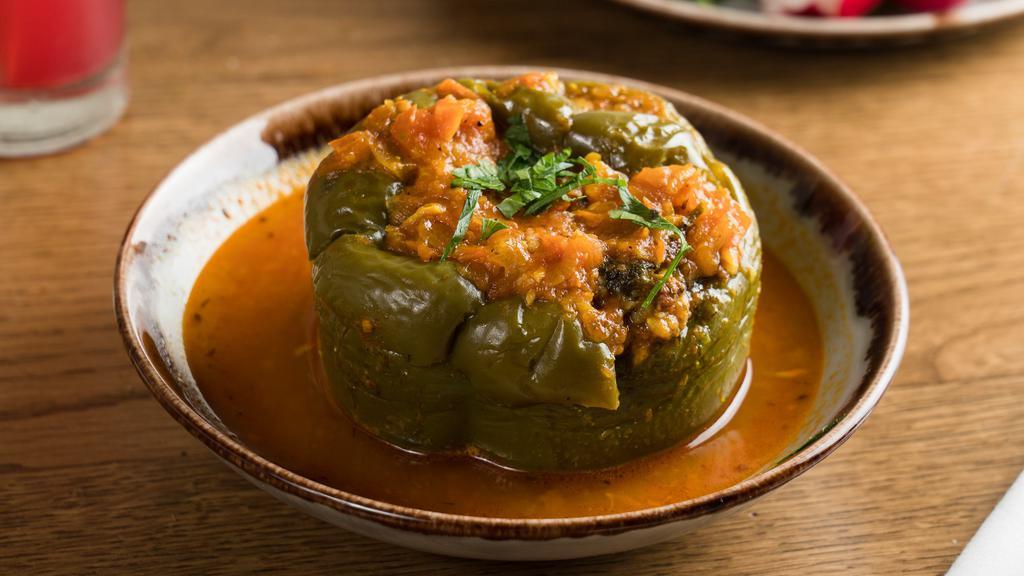 Stuffed Pepper Appetizer (Lunch) · Green pepper stuffed with ground beef, rice and herbs then slowly simmered with light tomato sauce.