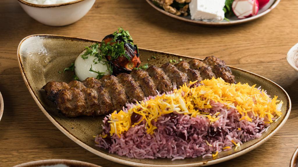 Lamb Koobideh Kebob (Lunch) · Two Skewers of chopped lamb, char grilled on our open flame grill