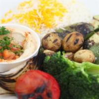 Vegetarian Kebob Dinner · An assortment of grilled vegetables served with hummus. Served with basmati rice, grilled on...