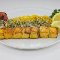 Shrimp Kebob Dinner · Marinated shrimp grilled on a skewer. Served with dilled rice, grilled onion, and tomato.