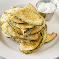 Kyclades Veggie Chips · Crispy eggplant and zucchini chips with tzatziki dip.