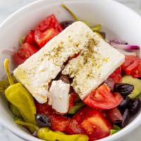 Greek Traditional · Romaine, cucumbers, kalamata olives, onions, tomatoes and feta.