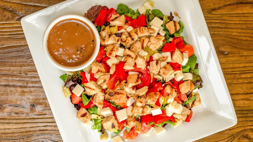 Villa'S Chopped Salad · Mesclun greens, grilled chicken, artichoke hearts, roasted red peppers, tomatoes and fresh mozzarella in a balsamic vinaigrette.