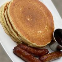 Pancakes With Meat · Comes with choice of meat. Served with butter and syrup.