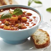 Minestrone Soup · Italian vegetable soup made with tomato broth and pasta.