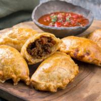 Beef Patty · Flaky pastry filled with delightfully seasoned beef.