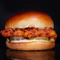 The Nashville Hot Sandwich · Cornflake Crusted Chicken Breast seasoned seasoned in our signature spice blend, dipped in s...
