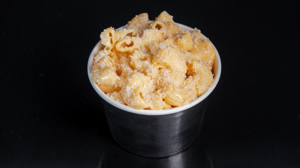 Sam'S Mac N' Cheese · Macaroni in a 3 cheese blended sauce, topped with Parmesan