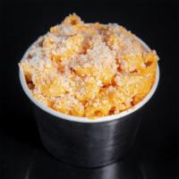 Sam'S Buffalo Mac N' Cheese · Macaroni in a 3 cheese blend sauce, topped with parmesan and our spicy buffalo sauce