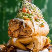 Chimichangas · Fried burrito stuffed rice and beans, chicken, beef, or pork, sour cream, pico de gallo, and...