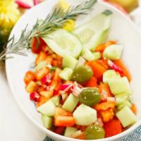 Shepherd Salad · Vegetarian, vegan, gluten free. Fresh tomatoes, onions, cucumbers, and green pepper tossed w...