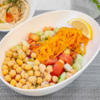 Chicpea Salad · Vegetarian, vegan, gluten free. Chopped cucumbers, tomatoes, red onions, carrots and chickpe...