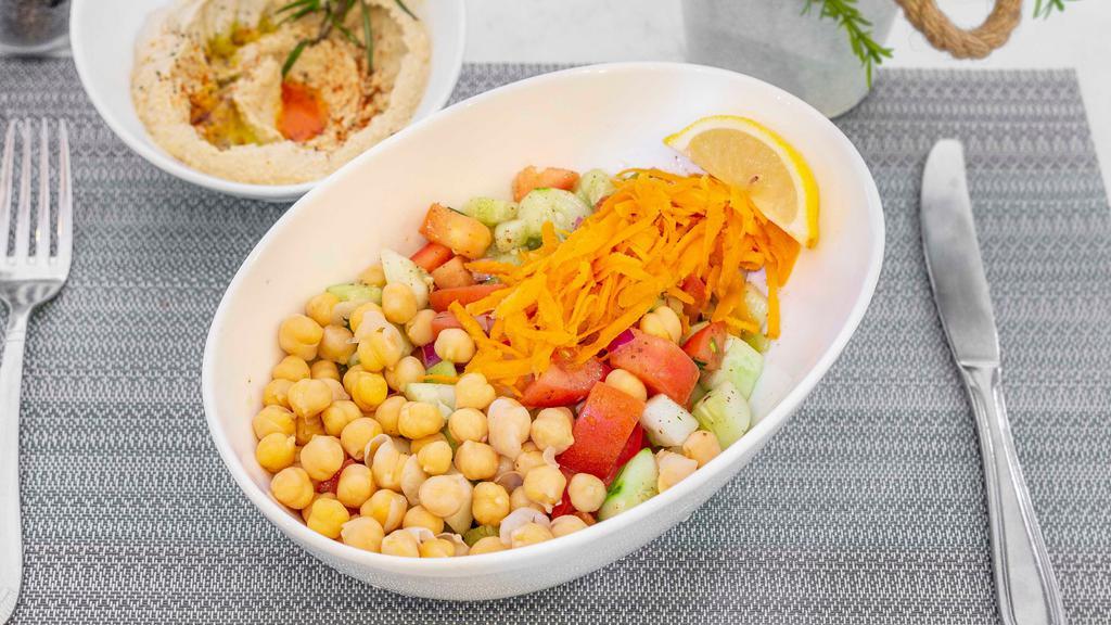 Chicpea Salad · Vegetarian, vegan, gluten free. Chopped cucumbers, tomatoes, red onions, carrots and chickpeas.