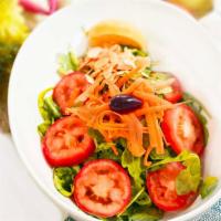Arugula Salad · Vegetarian, vegan, gluten free. Fresh arugula, roasted almonds, tomatoes, and carrots. Serve...