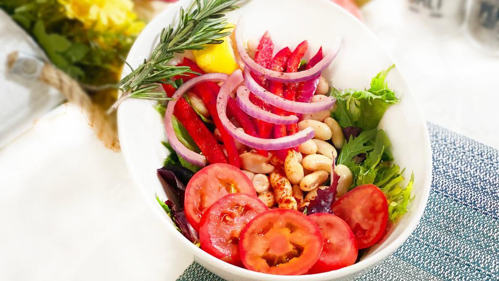 White Bean Salad · Vegetarian, vegan, gluten free. White kidney beans tossed with tomatoes, red onion, parsley, iceberg lettuce, olive oil, and lemon.
