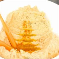 Hummus · Vegetarian, gluten free. Mashed chickpeas blended with fresh garlic, sesame paste, and Toros...