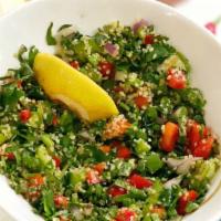 Tabuleh · Vegetarian, gluten free. A mixture of cracked wheat, green pepper, scallions, tomato, and pa...