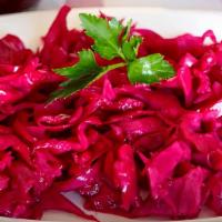 Red Cabbage · Marinated thin sliced red cabbage.