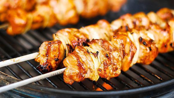 Chicken Shish Kebab · Char-grilled chunks of chicken breasts with rice and vegetables.