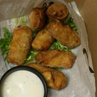 Cheesesteak Egg Rolls · Shaved, smoked ribeye with caramelized onions, mozzarella, cheddar and pepper jack, in wonto...