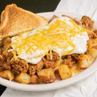 Sloppy Eggs · Camper Potatoes topped with sloppy joe mix, cheddar cheese mix, and 2 over easy eggs.