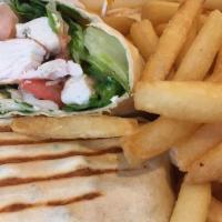 Greek Wrap · Grilled chicken with lettuce, tomato, feta cheese and tzatziki sauce.