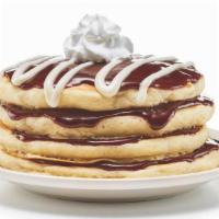 Cinn-A-Stack®Pancakes · Four buttermilk pancakes layered with cinnamon roll filling & topped with cream cheese icing.