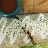 Burritos · Mama Lupita’s Bistro favorite: Stuffed with rice, beans, cheese, pico de gallo and choice of...