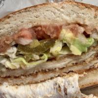 Tortas · Beans, lettuce, tomato, onions, pickled jalapeños, avocado and white cheese. Choice of meat.