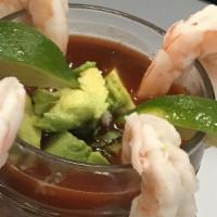 Shrimp Cocktail · Clamato, hot sauce, salt, lime juice, ketchup, onion, cilantro and avocado. Served with salt...