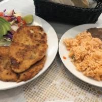 Breaded Chicken · Milanesa de pollo, served with Mama's salad, rice and beans.