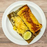Tamales Chapines · Corn tamale with chicken or pork.