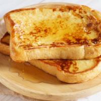 Original French Toast · 3 slices of challah bread soaked in eggs and milk, then fried served with a side of butter a...