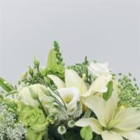 Jade · Jade is a beautiful Green and White arrangement featuring White Asiatic Lilies, White Roses,...