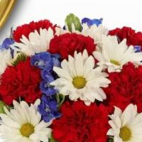 American Glory Flowers · Bouquet of assorted flowers with blue, white and red colors.