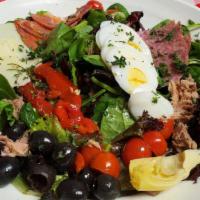 Antipasto · On a bed of mixed greens, Genoa salami, Capicola,  provolone, black olives, cherry tomatoes,...
