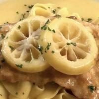 Chicken Francaise · Dipped in a seasoned egg batter and pan seared in a white wine lemon butter sauce.. Served o...
