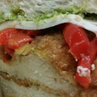 Don Giovanni · Crispy chicken cutlet, roasted peppers, fresh mozzarella and pesto on a Portuguese roll.