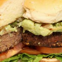 Ranchero Burger · Grilled onions, green peppers, lettuce, tomato, smothered with guacamole with a veggie patty.