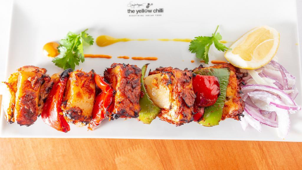 Harippa Paneer Tikka  · Tandoor cooked cottage cheese tikka in a blend of tomato and spices  
Served with one optional side of either RICE or BREAD and signature GULAB KA KHEER
SELECT ONE -
Mini Breads – Plain Naan, Butter Naan, Roti