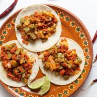 Chorizo Tacos · Fresh Chorizo (Spicy Pork Meat) Tacos made with fresh pico de gallo and combined with delici...