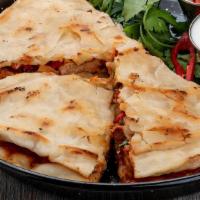 Spicy Chicken Quesadilla · Fresh Quesadilla made with Spicy grilled chicken, cheddar cheese, jack cheese, salsa, and so...