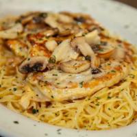 Lemon Chicken Piccata · Sauteed Chicken Breast with Creamy Lemon Sauce, Mushrooms, Artichoke and Capers. Served over...
