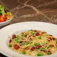 Pasta Carbonara · Imported Spaghettini Tossed with Smoked Bacon, Peas, a Touch of Garlic and a Parmesan Cream ...