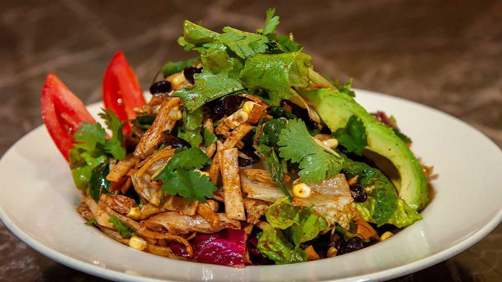 Southwestern Salad · Chicken Breast, Fresh Corn, Black Beans, Tortilla Strips, Avocado, Cilantro and Pepper-Jack Cheese. Tossed in a Honey-Lime Vinaigrette