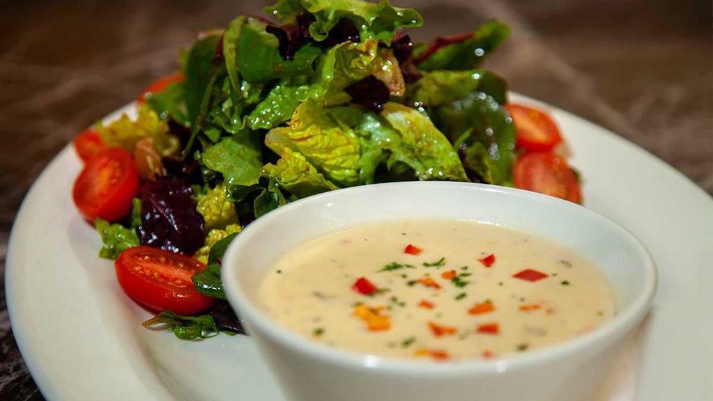 Soup And Salad · A Cup of Our Soup of the Day and a Mixed Green Salad