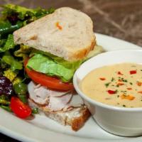 Lunch Special Turkey Sandwich · One-Half of a Turkey Sandwich, a Cup of Our Soup and a Mixed Green Salad