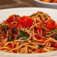 Pasta Pomodoro · Spaghettini Tossed with Sauteed Tomatoes, Fresh Basil, Tomato Sauce and Parmesan Cheese
