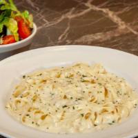 Lunch Special Fettuccini Alfredo · A Lunch Portion of Pasta and a Mixed Green Salad.  Tossed in a Rich Parmesan Cream Sauce